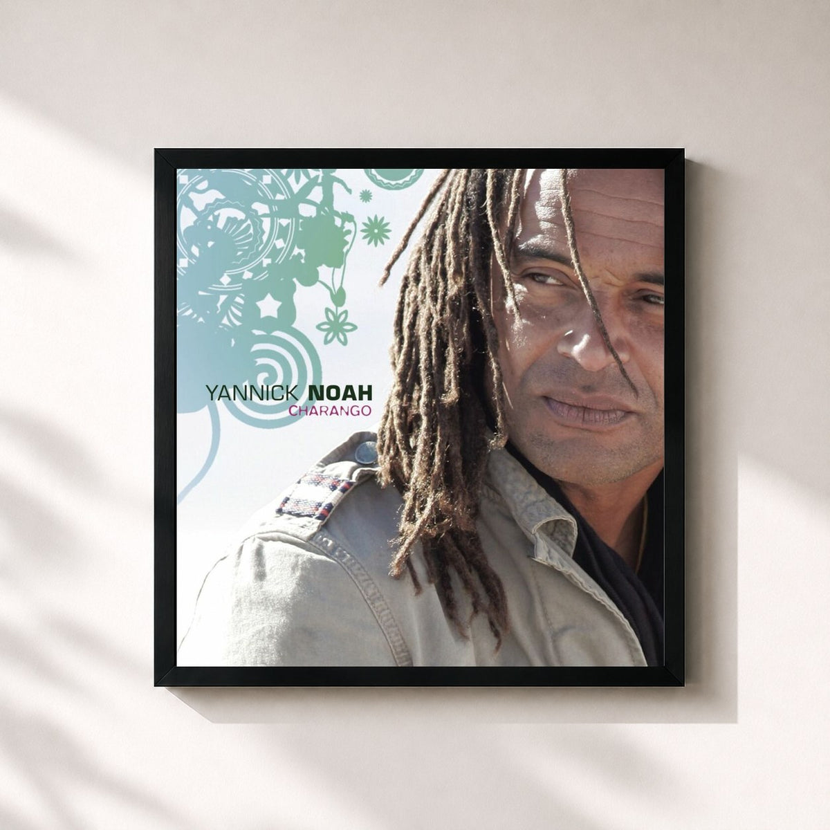 #noir Charango by Yannick Noah as a square framed art print, black 32x32 cm frame