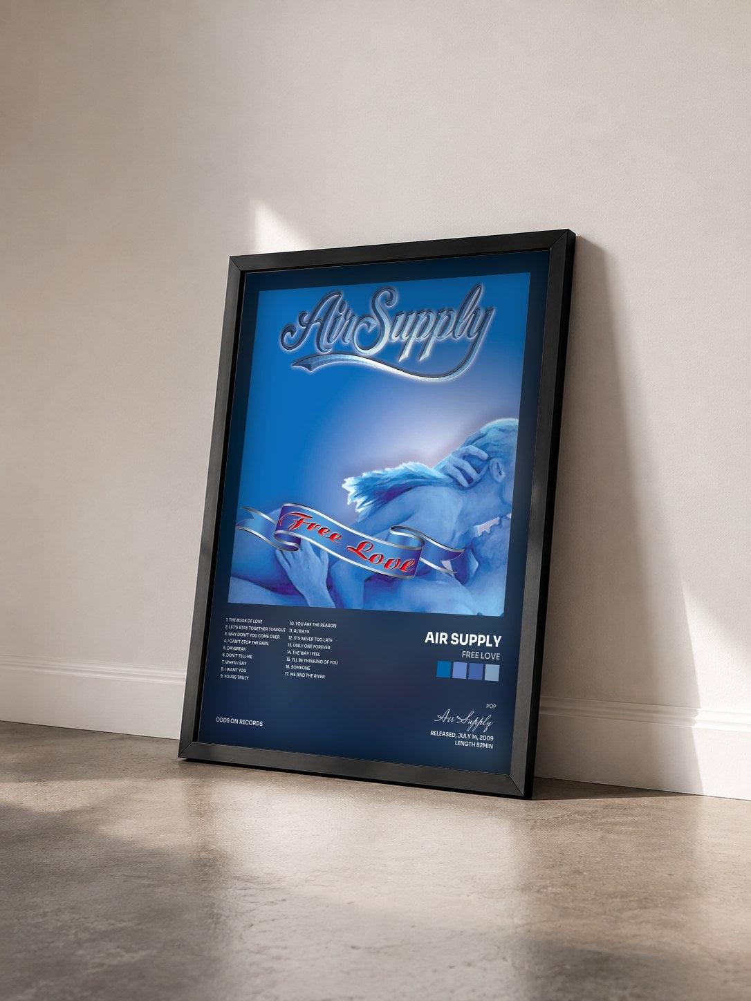#noir Free Love by Air Supply as a framed art print seen at an angle, black frame