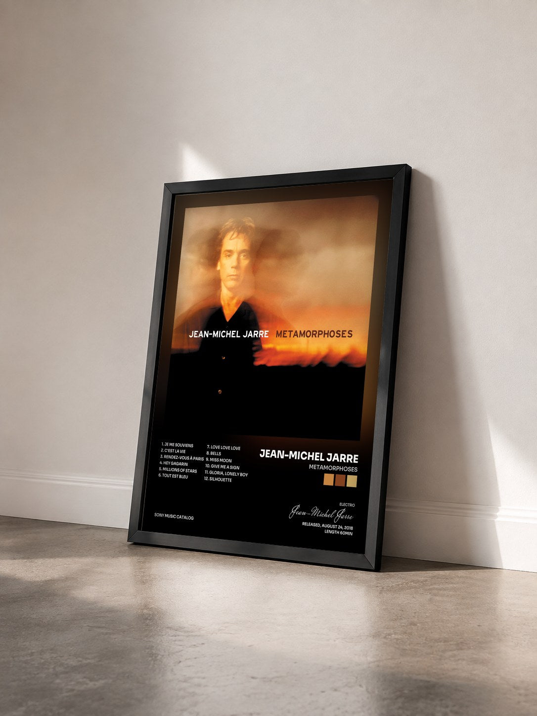 #noir Tableau de l'album Metamorphoses de Jean-Michel Jarre vu de trois quarts, cadre noir