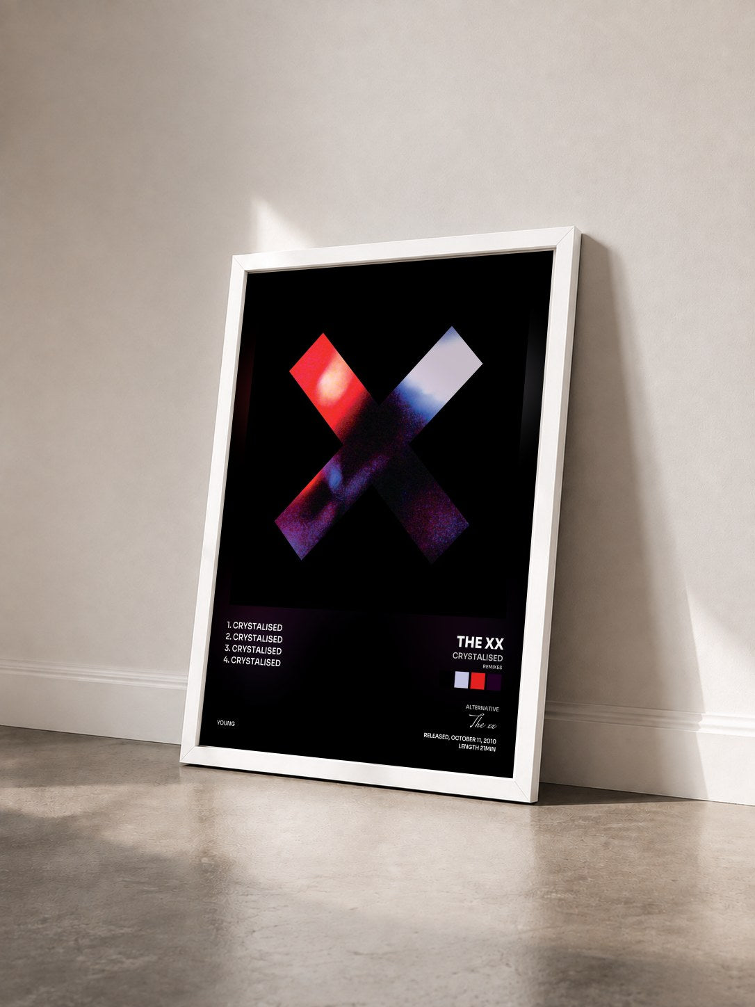 #blanc Tableau de l'album Crystalised (Remixes) de The xx vu de trois quarts, cadre blanc