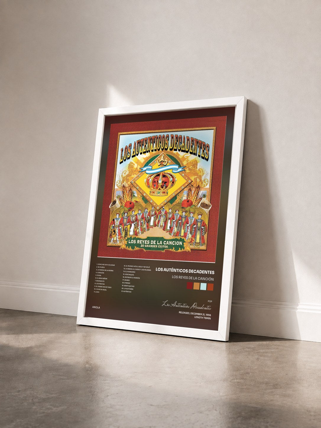 #blanc Tableau de l'album Los Reyes de la Canción de Los Auténticos Decadentes vu de trois quarts, cadre blanc