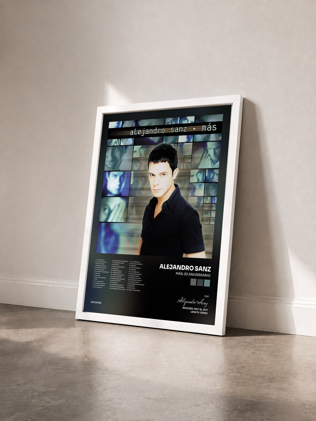 #blanc Tableau de l'album Más: 20 Aniversario de Alejandro Sanz vu de trois quarts, cadre blanc