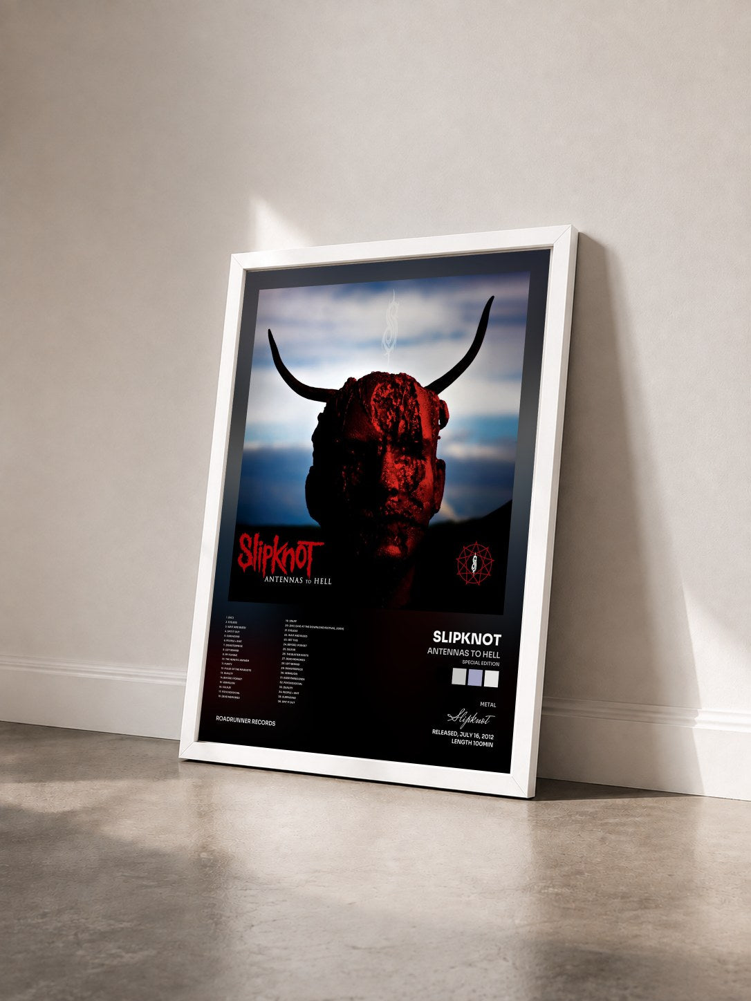 #blanc Antennas to Hell (Special Edition) by Slipknot as a framed art print seen at an angle, white frame