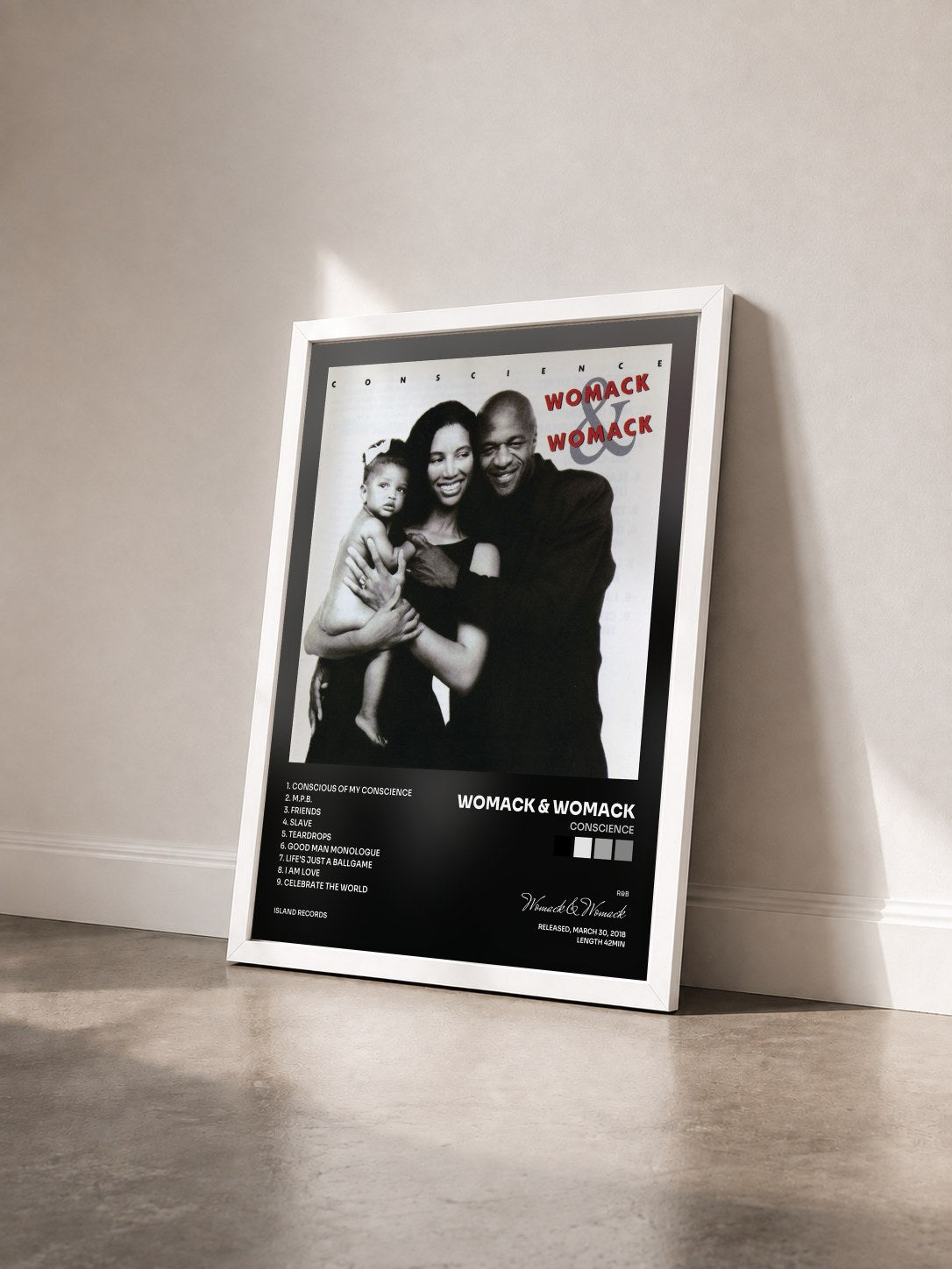 #blanc Tableau de l'album Conscience de Womack & Womack vu de trois quarts, cadre blanc
