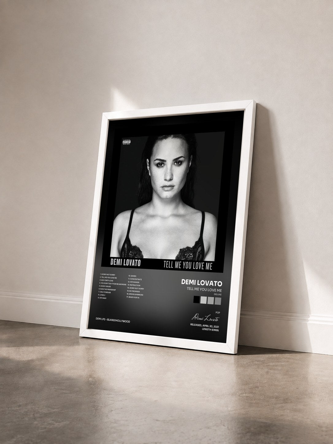 #blanc Tableau de l'album Tell Me You Love Me (Deluxe) de Demi Lovato vu de trois quarts, cadre blanc