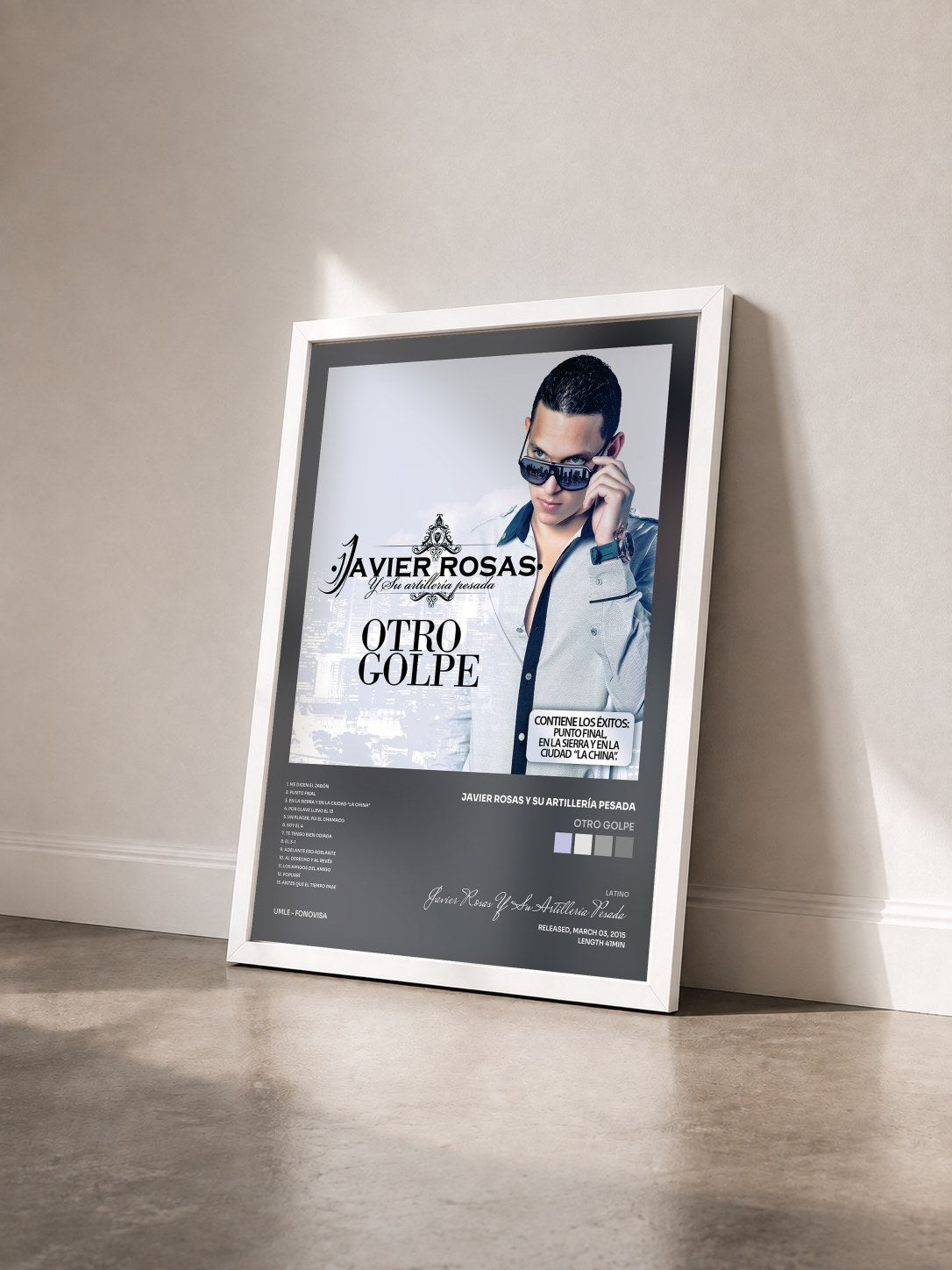 #blanc Tableau de l'album Otro Golpe de Javier Rosas Y Su Artillería Pesada vu de trois quarts, cadre blanc