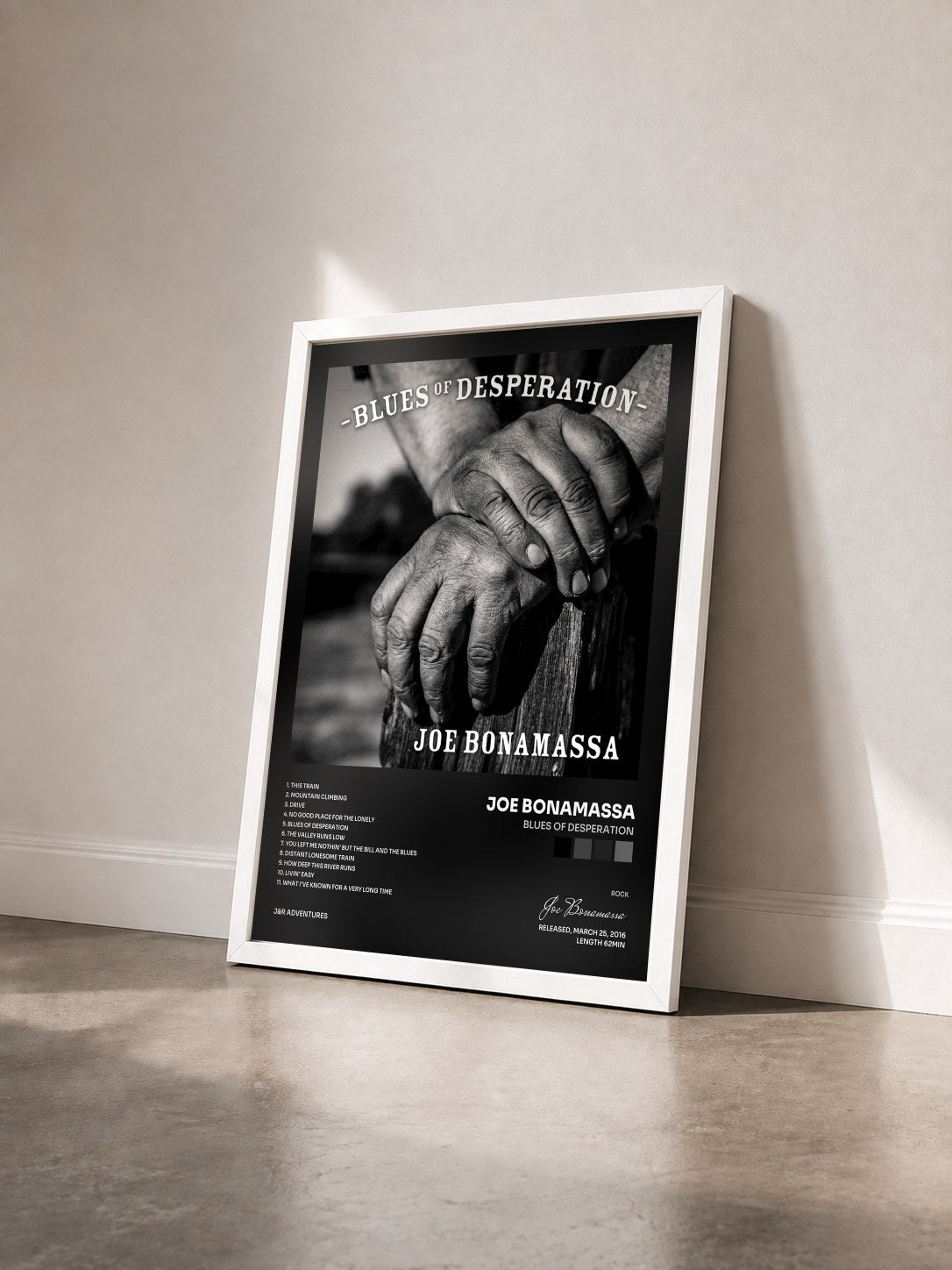 #blanc Blues Of Desperation de Joe Bonamassa en lámina enmarcada vista de tres cuartos, marco blanco