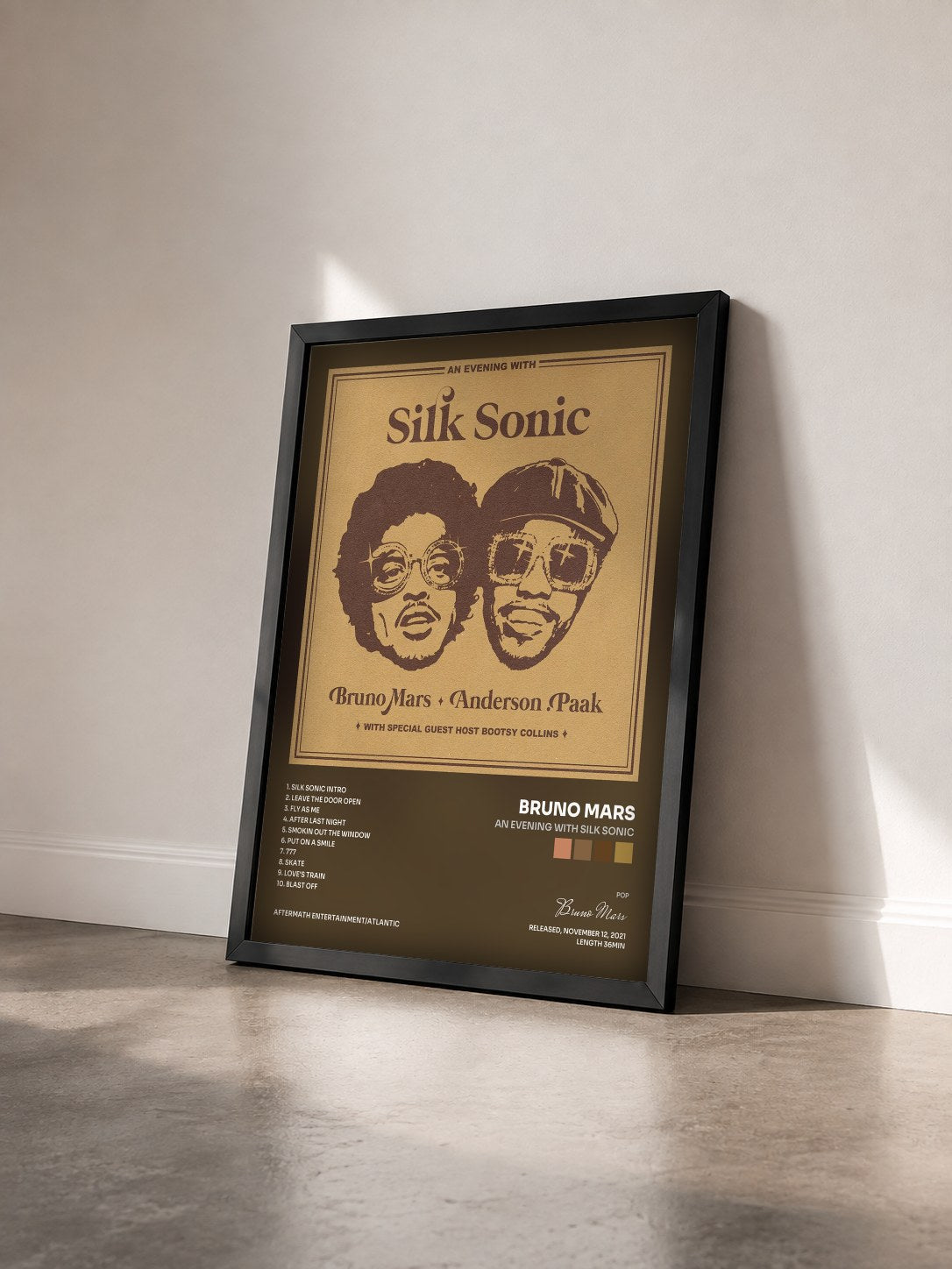 #noir An Evening With Silk Sonic by Bruno Mars as a framed art print seen at an angle, black frame