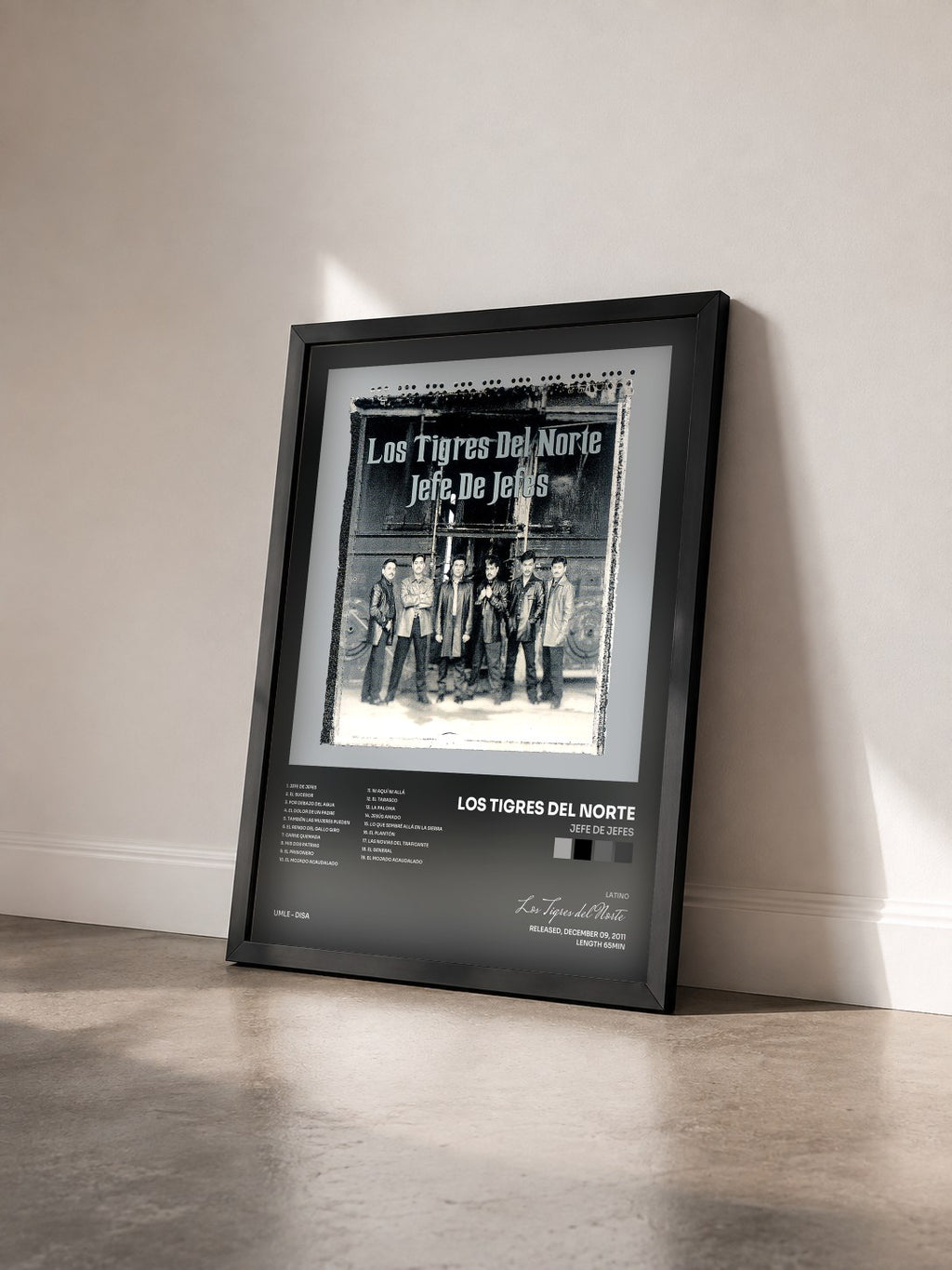 #noir Tableau de l'album Jefe De Jefes de Los Tigres del Norte vu de trois quarts, cadre noir