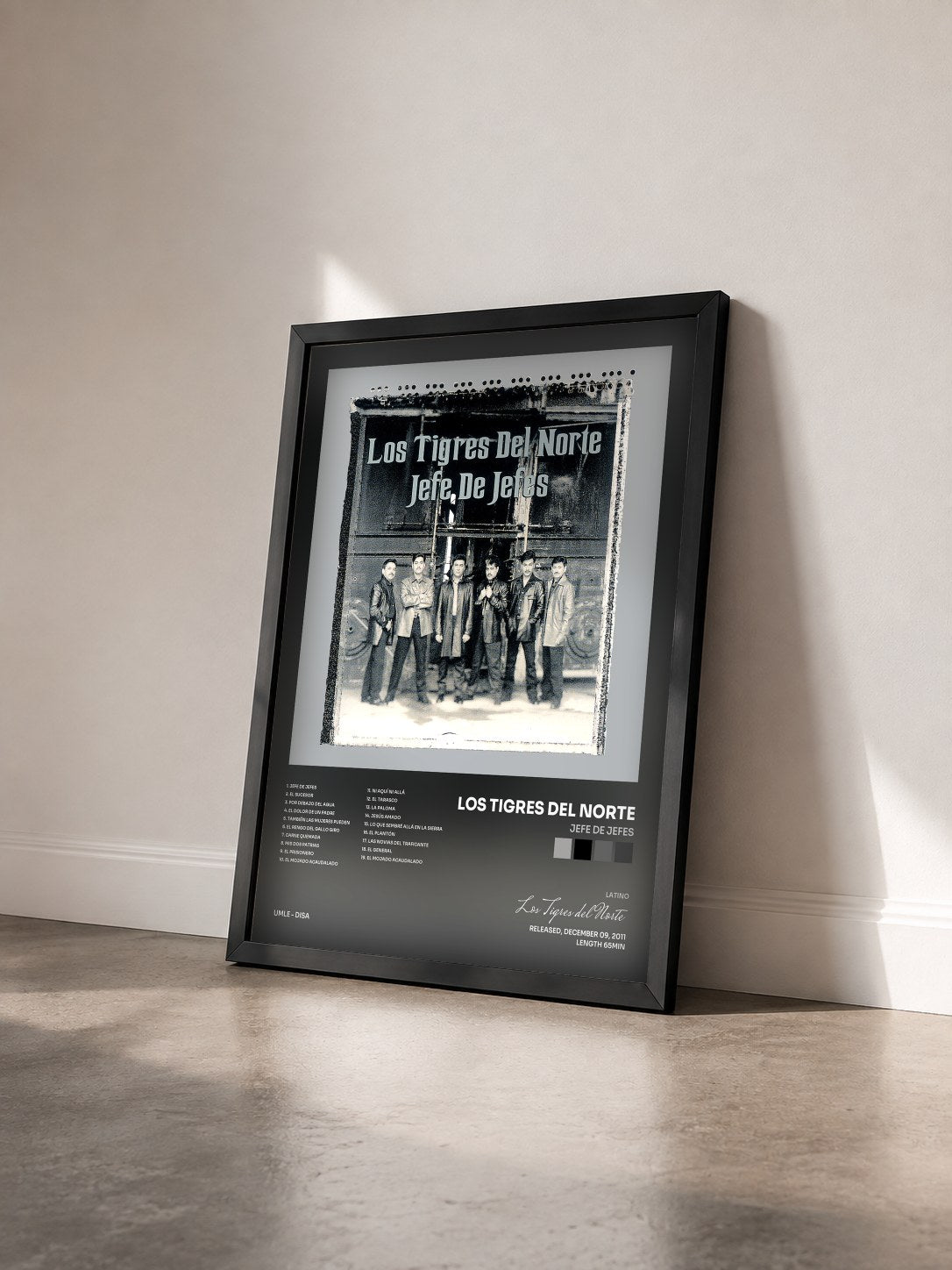 #noir Tableau de l'album Jefe De Jefes de Los Tigres del Norte vu de trois quarts, cadre noir