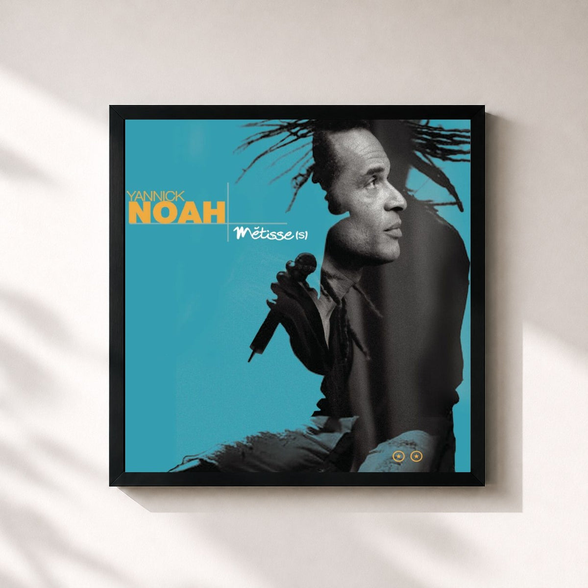 #noir Métisse(s) by Yannick Noah as a square framed art print, black 32x32 cm frame