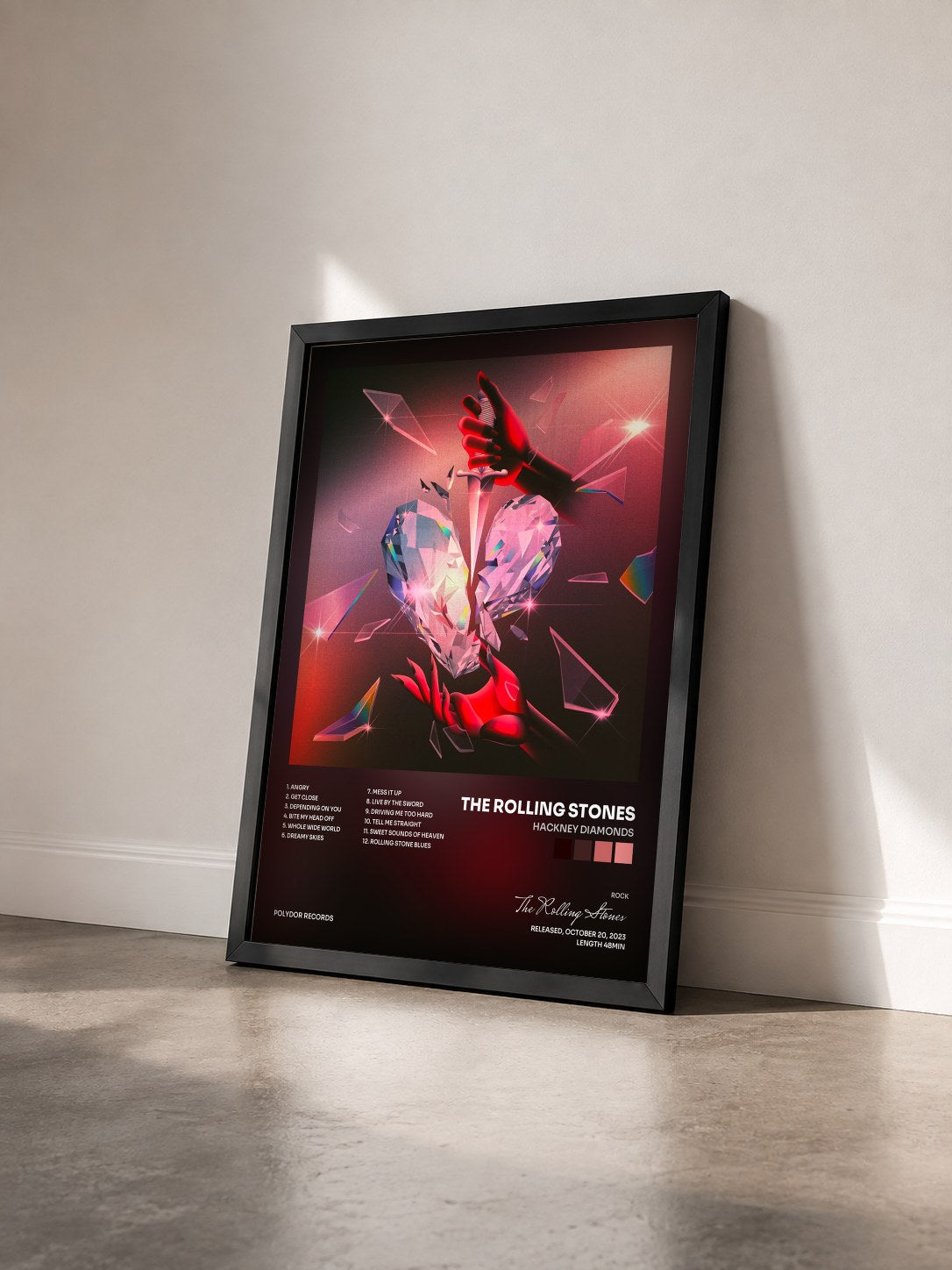 #noir Tableau de l'album Hackney Diamonds de The Rolling Stones vu de trois quarts, cadre noir