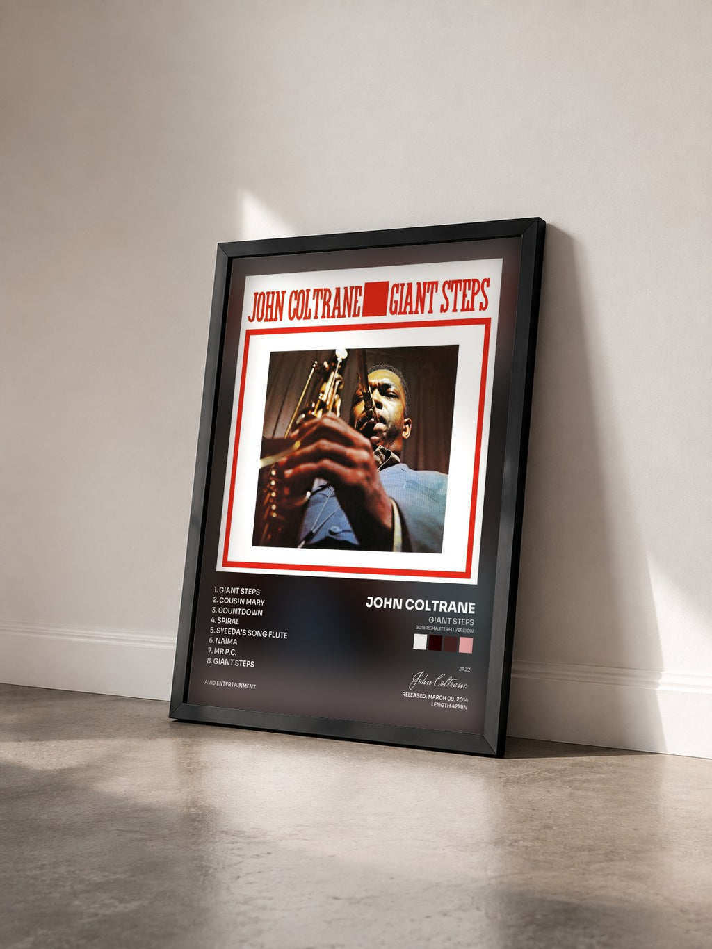 #noir Tableau de l'album Giant Steps (2014 Remastered Version) de John Coltrane vu de trois quarts, cadre noir