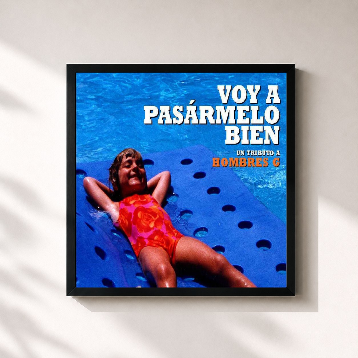 #noir Tableau carré de l'album Voy a pasarmelo bien. Tributo a Hombres G de Hombres G, cadre noir 32x32 cm