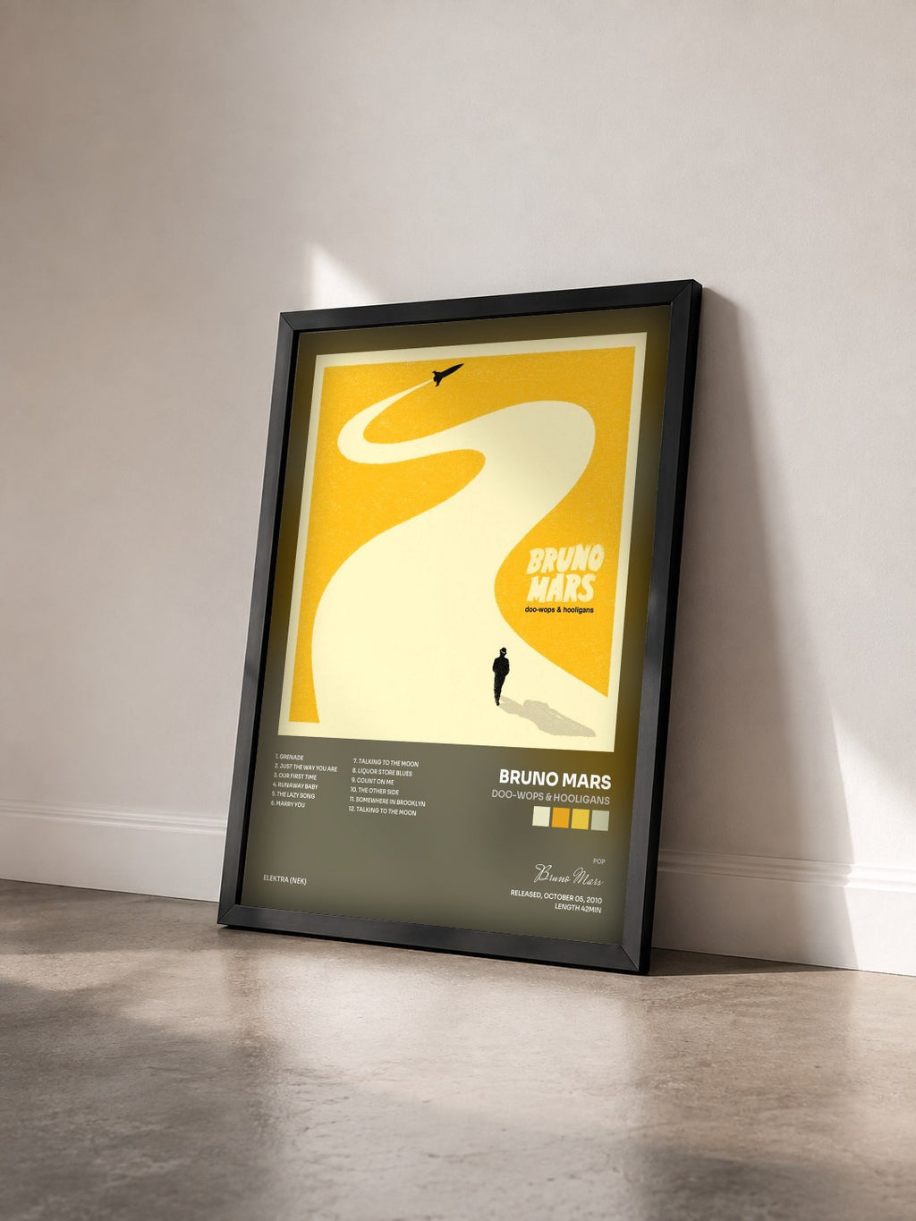 #noir Tableau de l'album Doo-Wops & Hooligans de Bruno Mars vu de trois quarts, cadre noir