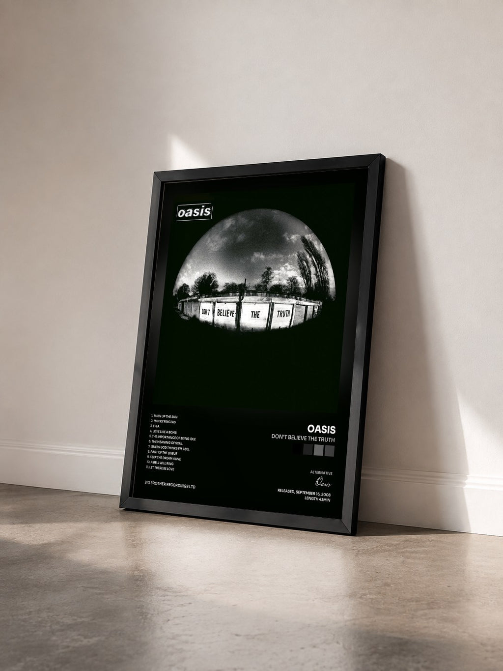 #noir Tableau de l'album Don't Believe The Truth de Oasis vu de trois quarts, cadre noir