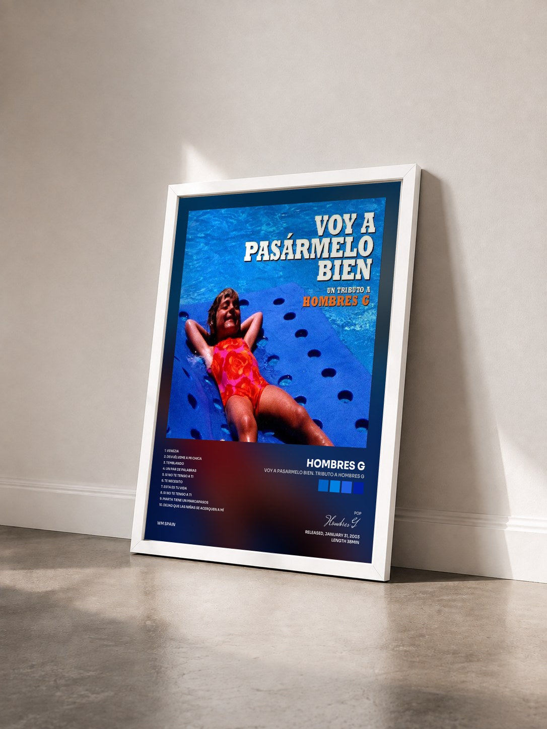 #blanc Tableau de l'album Voy a pasarmelo bien. Tributo a Hombres G de Hombres G vu de trois quarts, cadre blanc