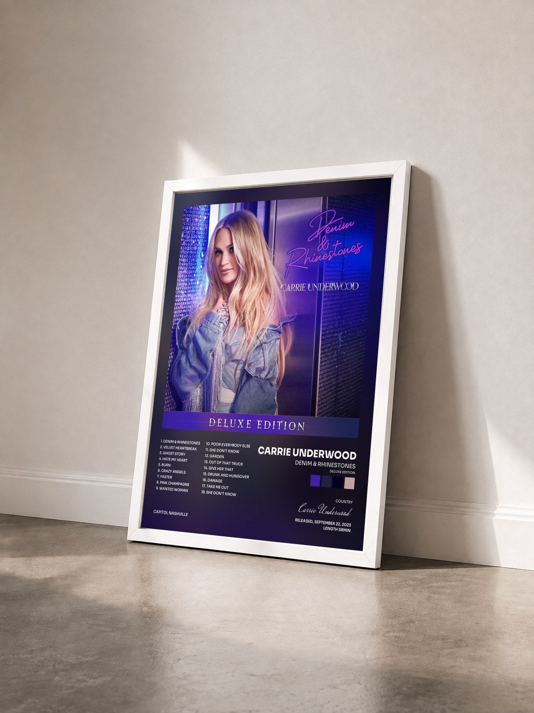 #blanc Tableau de l'album Denim & Rhinestones (Deluxe Edition) de Carrie Underwood vu de trois quarts, cadre blanc