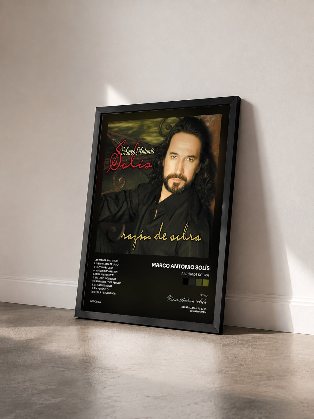 #noir Tableau de l'album Razón De Sobra de Marco Antonio Solís vu de trois quarts, cadre noir