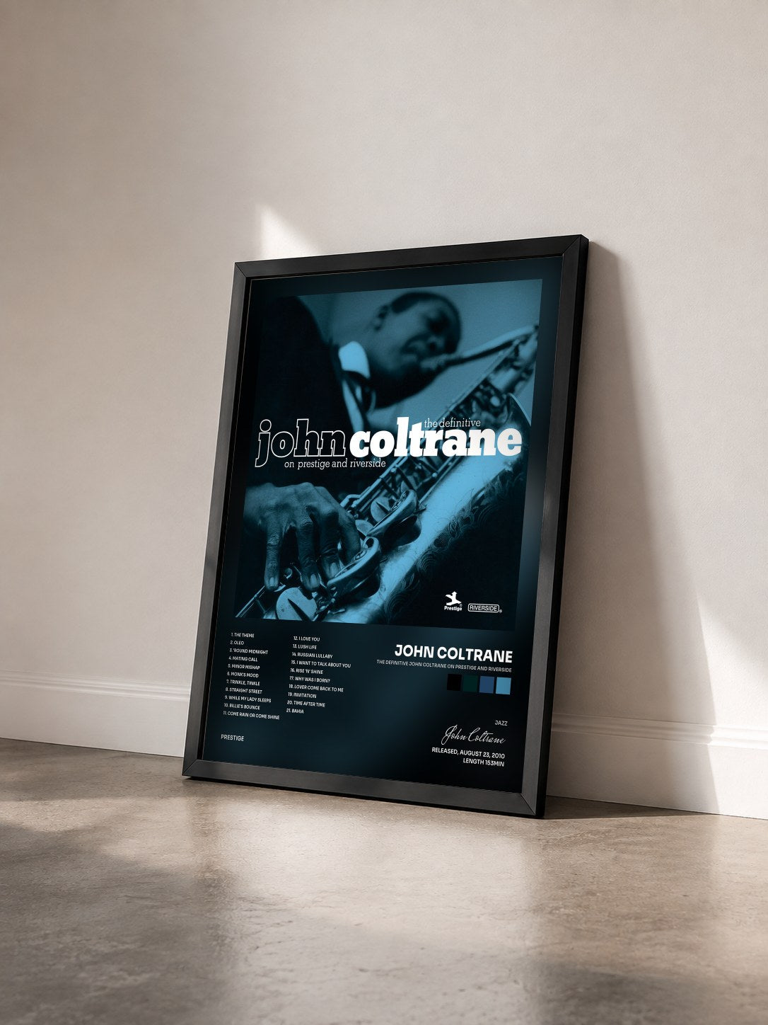 #noir Tableau de l'album The Definitive John Coltrane On Prestige And Riverside de John Coltrane vu de trois quarts, cadre noir