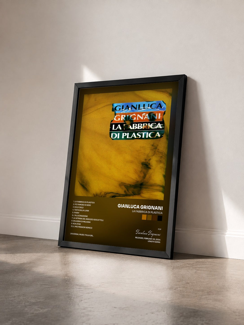 #noir Tableau de l'album La Fabbrica Di Plastica de Gianluca Grignani vu de trois quarts, cadre noir