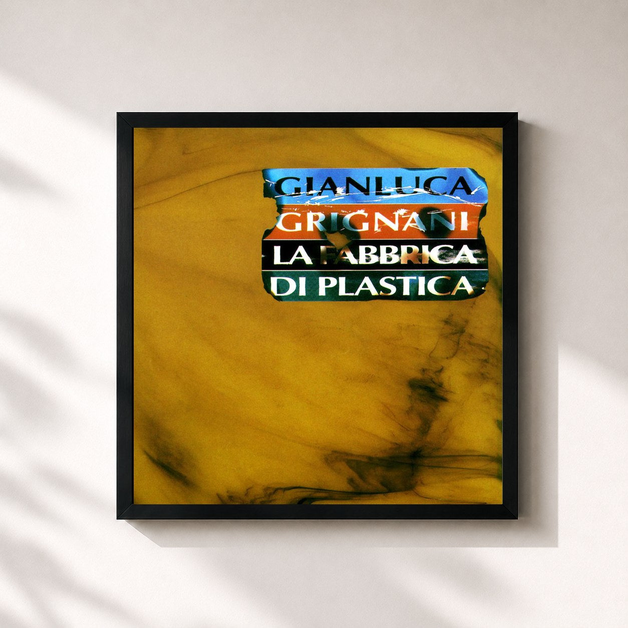 #noir Tableau carré de l'album La Fabbrica Di Plastica de Gianluca Grignani, cadre noir 32x32 cm