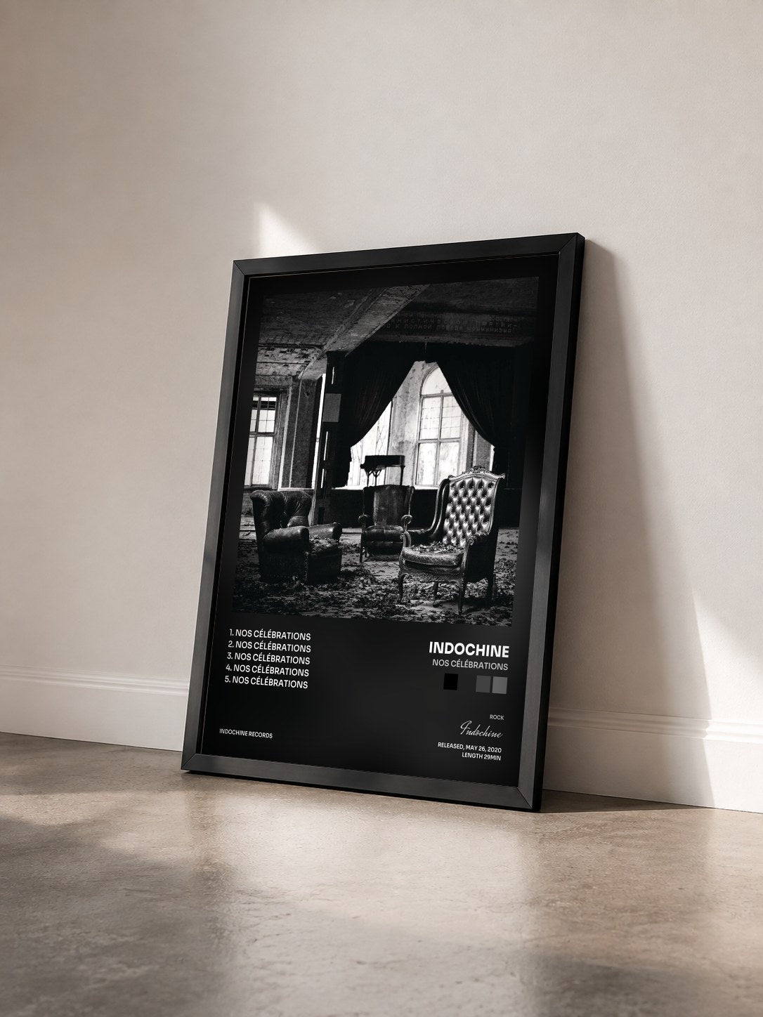 #noir Nos célébrations by Indochine as a framed art print seen at an angle, black frame