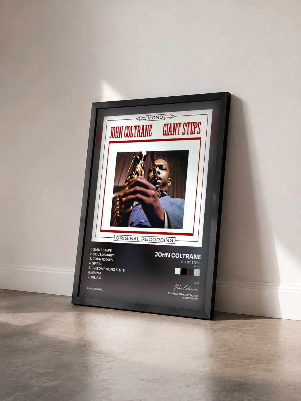 #noir Tableau de l'album Giant Steps (Mono) de John Coltrane vu de trois quarts, cadre noir