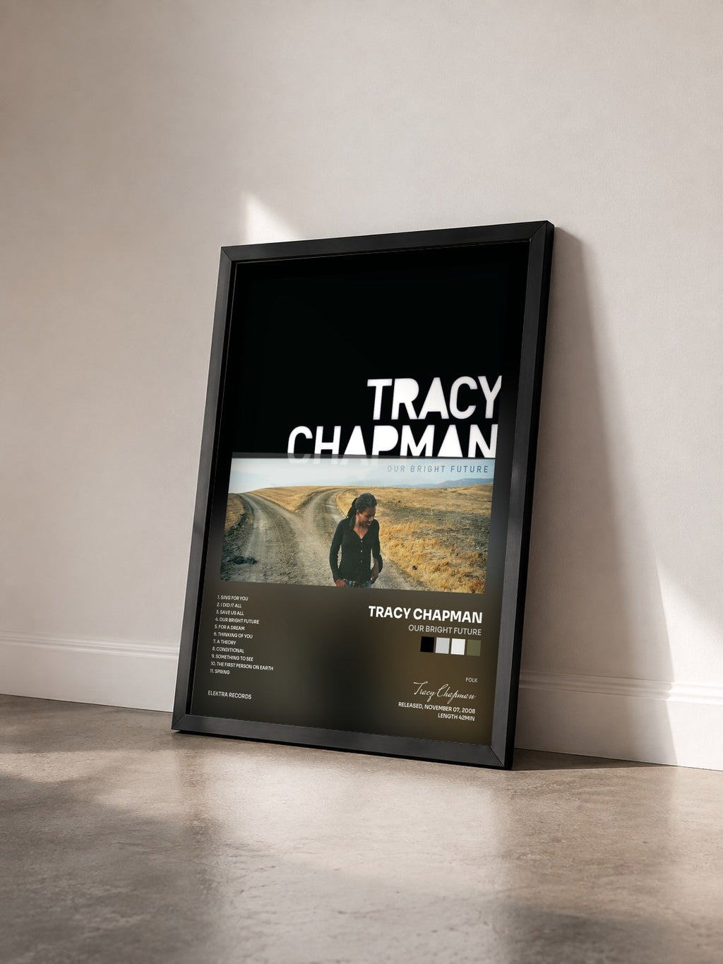 #noir Tableau de l'album Our Bright Future de Tracy Chapman vu de trois quarts, cadre noir