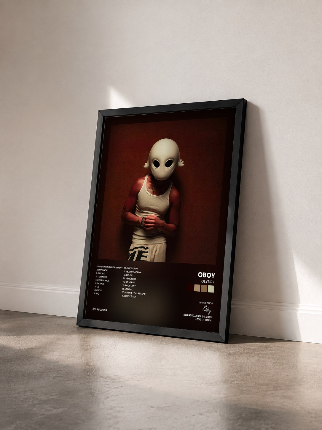 #noir Tableau de l'album Olyboy de Oboy vu de trois quarts, cadre noir