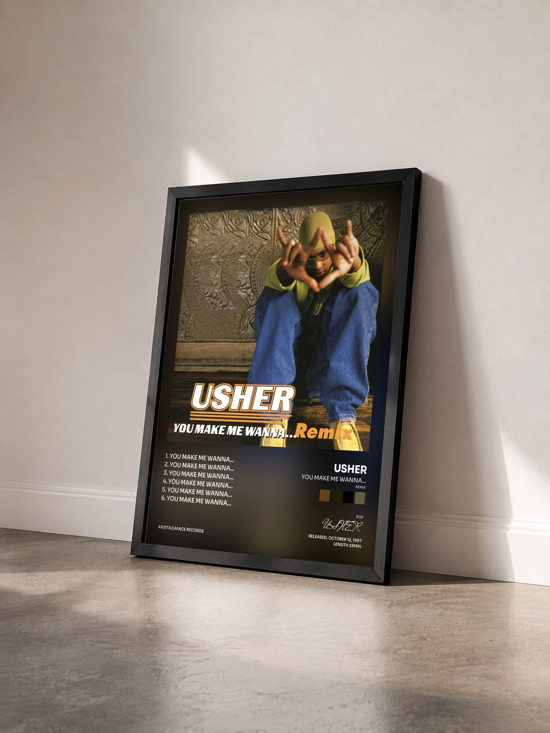 #noir Tableau de l'album You Make Me Wanna... (Remix) de USHER vu de trois quarts, cadre noir