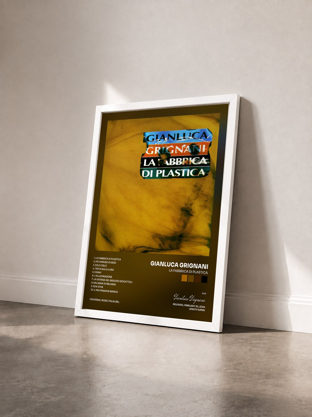 #blanc Tableau de l'album La Fabbrica Di Plastica de Gianluca Grignani vu de trois quarts, cadre blanc