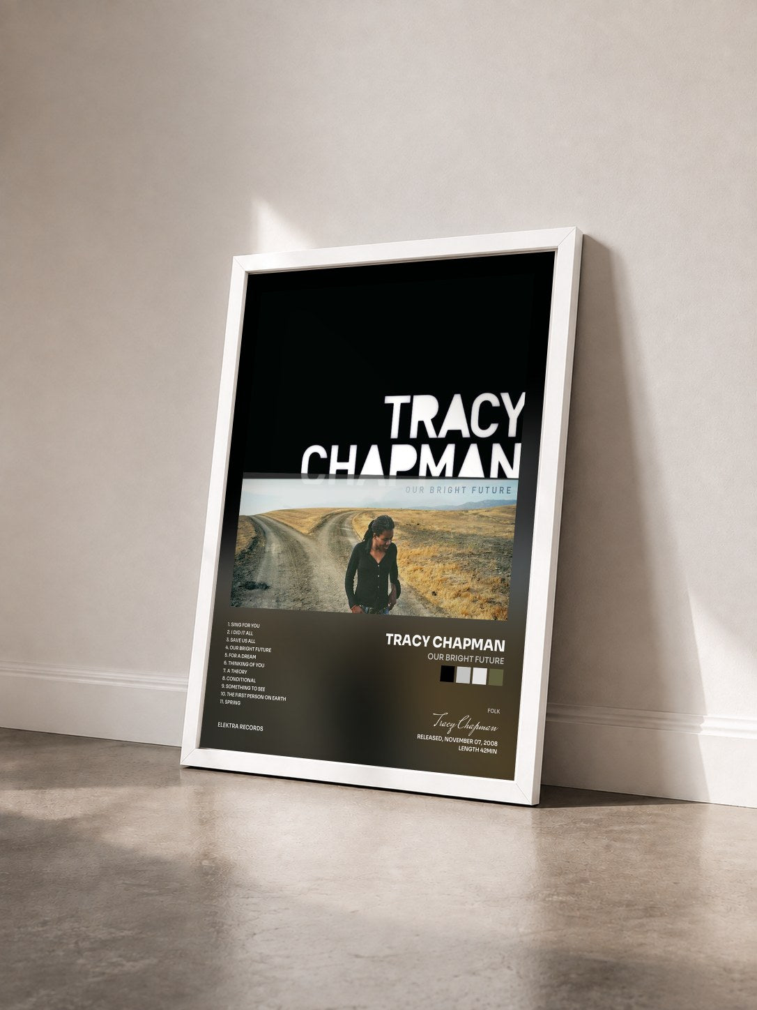 #blanc Tableau de l'album Our Bright Future de Tracy Chapman vu de trois quarts, cadre blanc