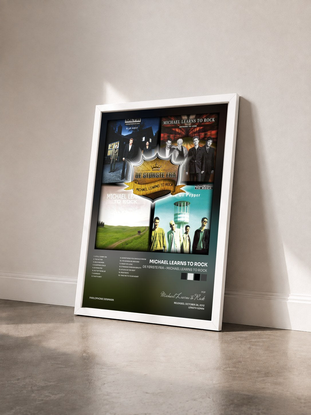 #blanc Tableau de l'album De Første Fra - Michael Learns to Rock de Michael Learns to Rock vu de trois quarts, cadre blanc