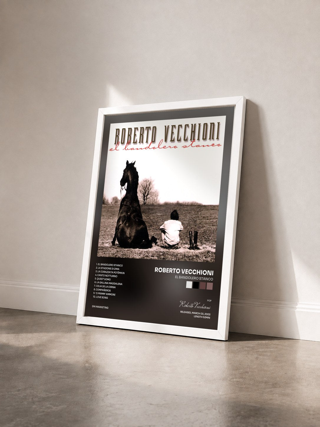 #blanc Tableau de l'album El Bandolero Stanco de Roberto Vecchioni vu de trois quarts, cadre blanc