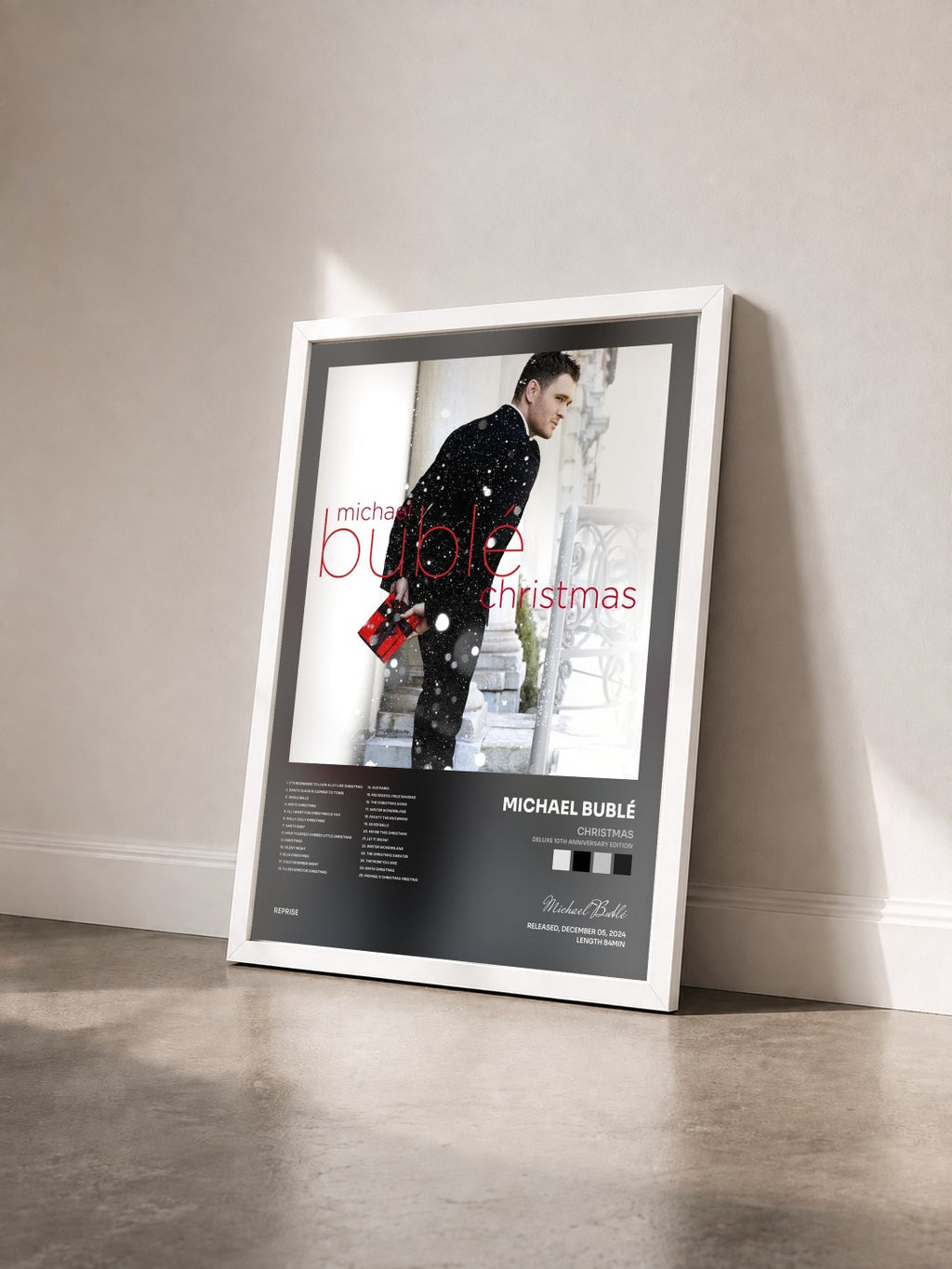 #blanc Christmas (Deluxe 10th Anniversary Edition) by Michael Bublé as a framed art print seen at an angle, white frame