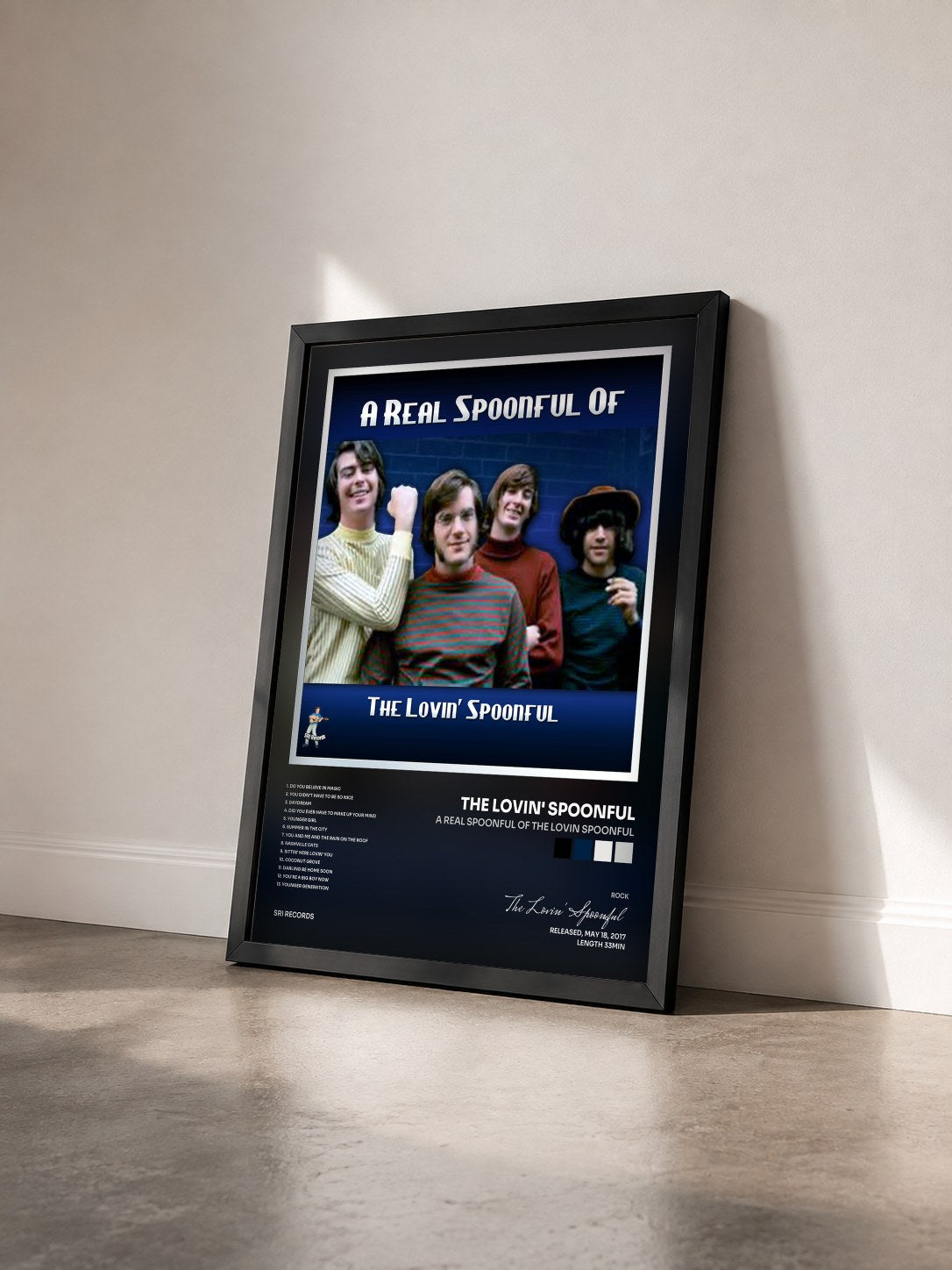 #noir Tableau de l'album A Real Spoonful of The Lovin Spoonful de The Lovin' Spoonful vu de trois quarts, cadre noir