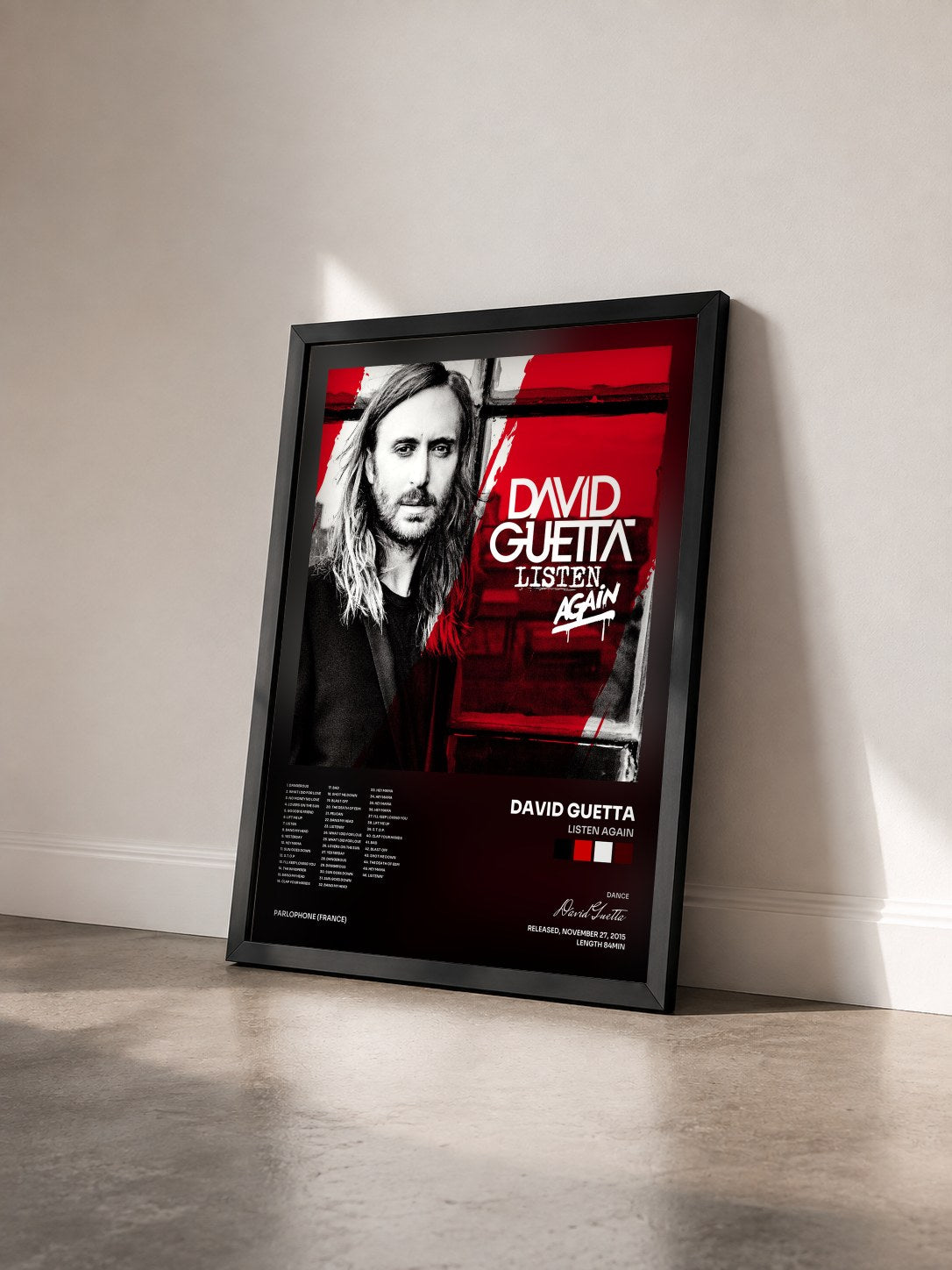 #noir Tableau de l'album Listen Again de David Guetta vu de trois quarts, cadre noir