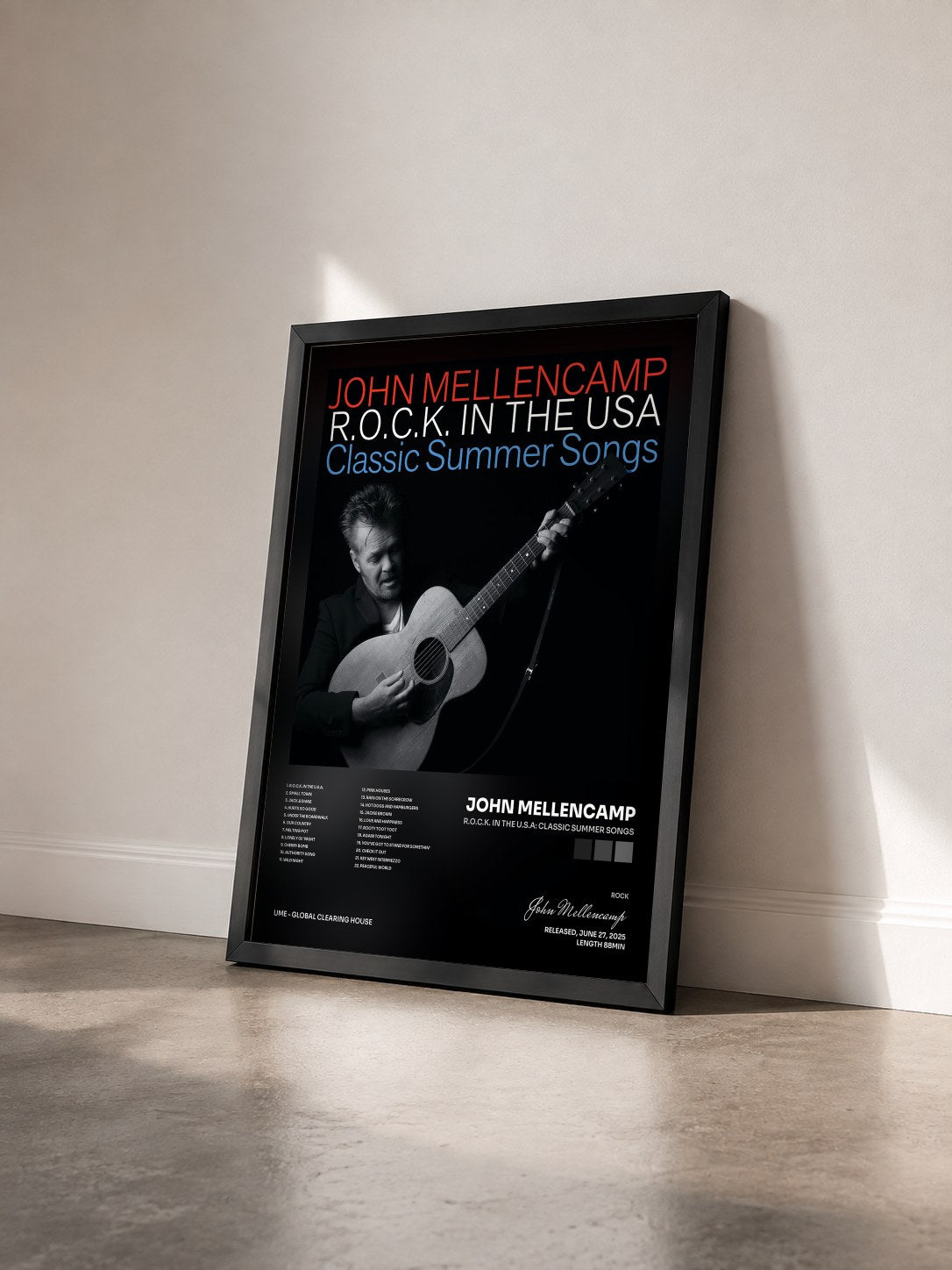 #noir R.O.C.K. in the U.S.A: Classic Summer Songs by John Mellencamp as a framed art print seen at an angle, black frame