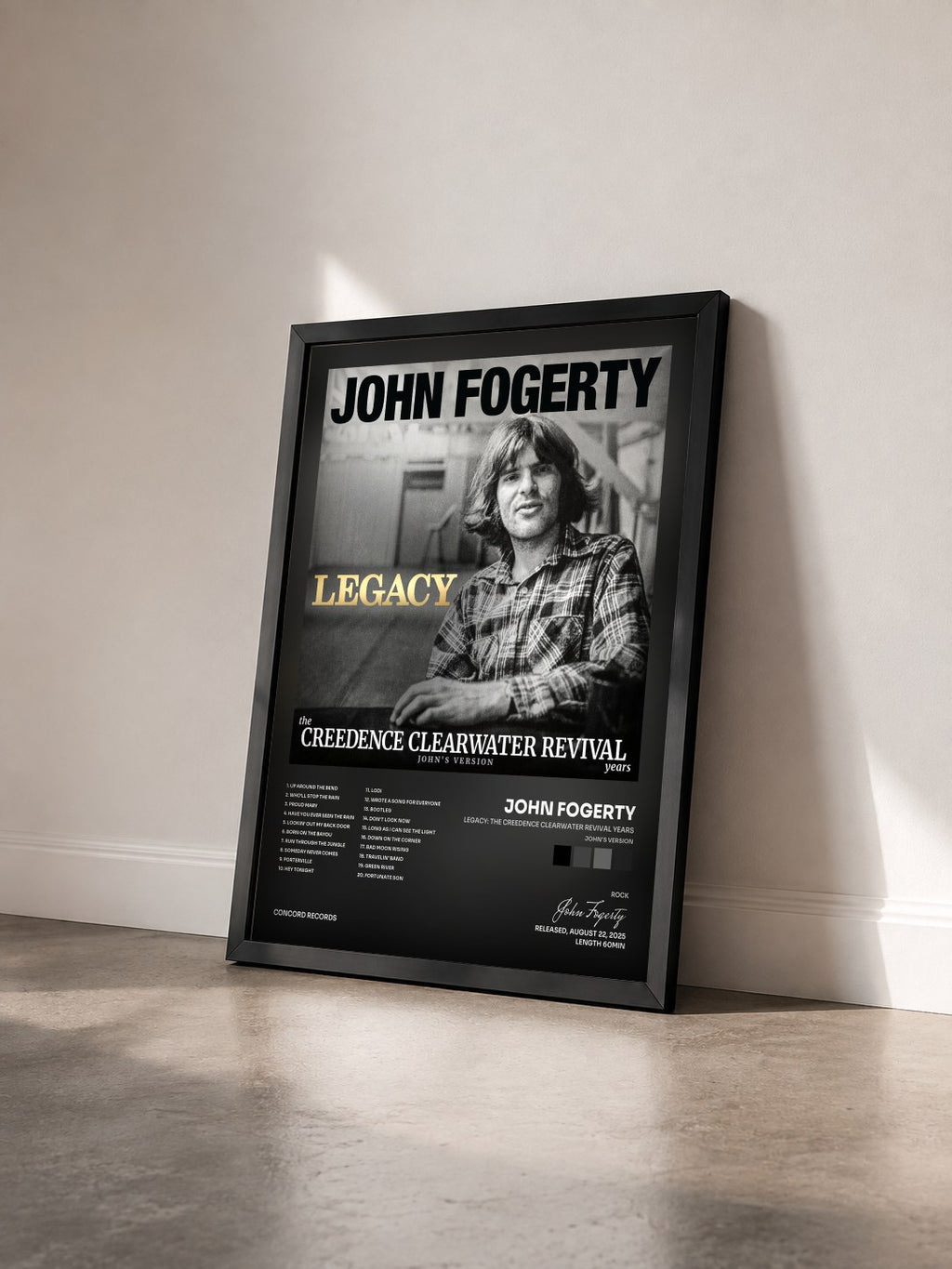 #noir Tableau de l'album Legacy: the Creedence Clearwater Revival years (John's Version) de John Fogerty vu de trois quarts, cadre noir