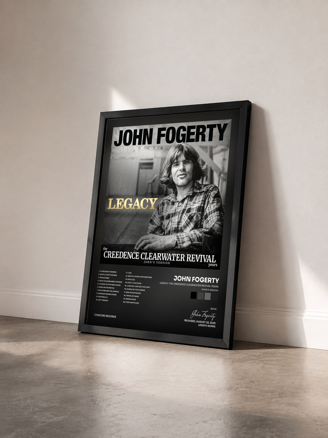 #noir Tableau de l'album Legacy: the Creedence Clearwater Revival years (John's Version) de John Fogerty vu de trois quarts, cadre noir