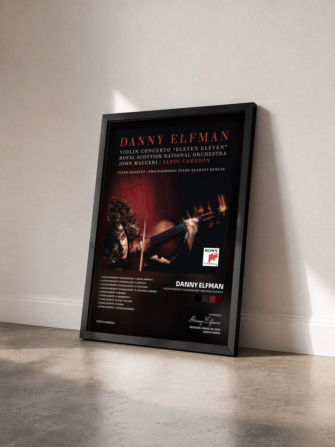 #noir Tableau de l'album Violin Concerto "Eleven Eleven" and Piano Quartet de Danny Elfman vu de trois quarts, cadre noir