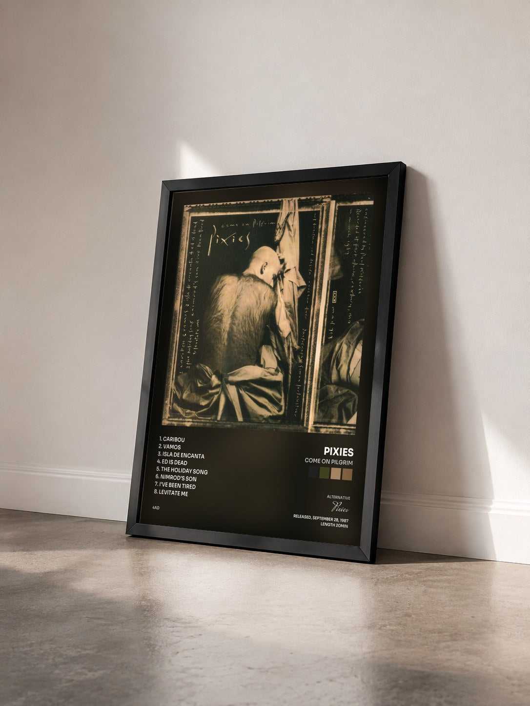 #noir Tableau de l'album Come On Pilgrim de Pixies vu de trois quarts, cadre noir