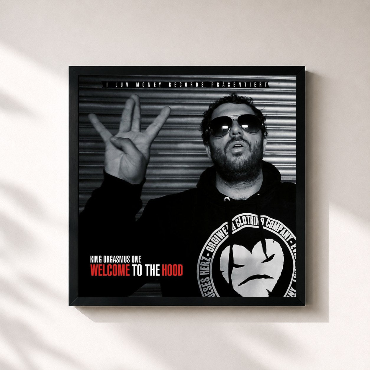 #noir Tableau carré de l'album Welcome to the Hood de King Orgasmus One, cadre noir 32x32 cm
