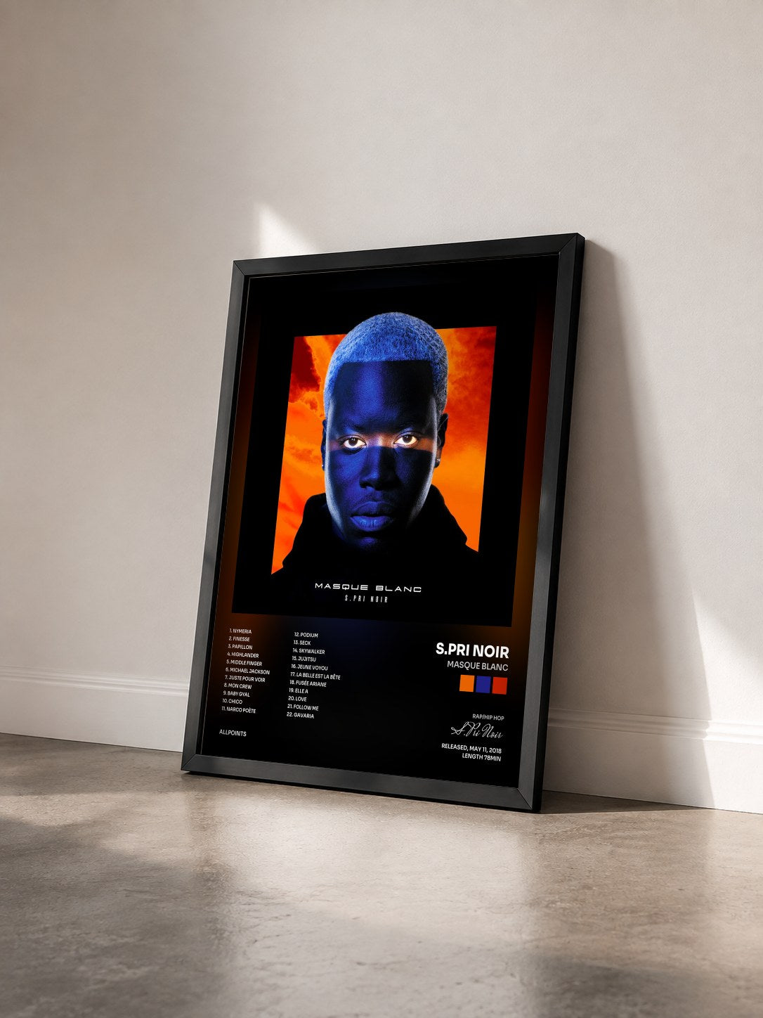 #noir Masque blanc by S.Pri Noir as a framed art print seen at an angle, black frame