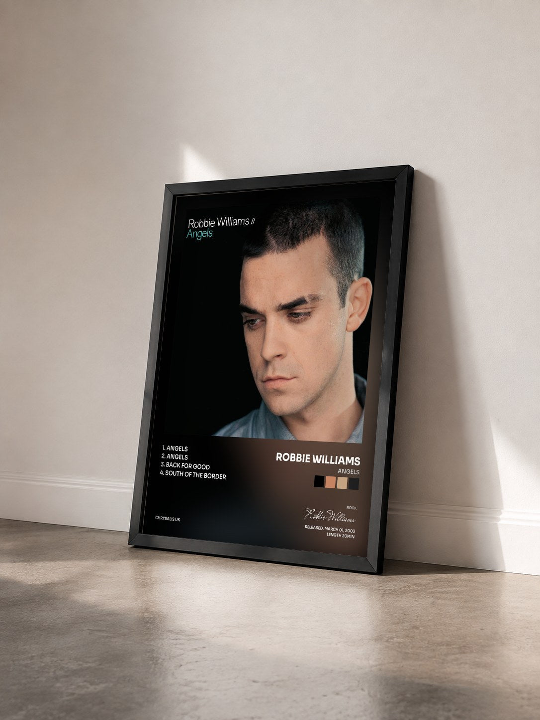 #noir Tableau de l'album Angels de Robbie Williams vu de trois quarts, cadre noir