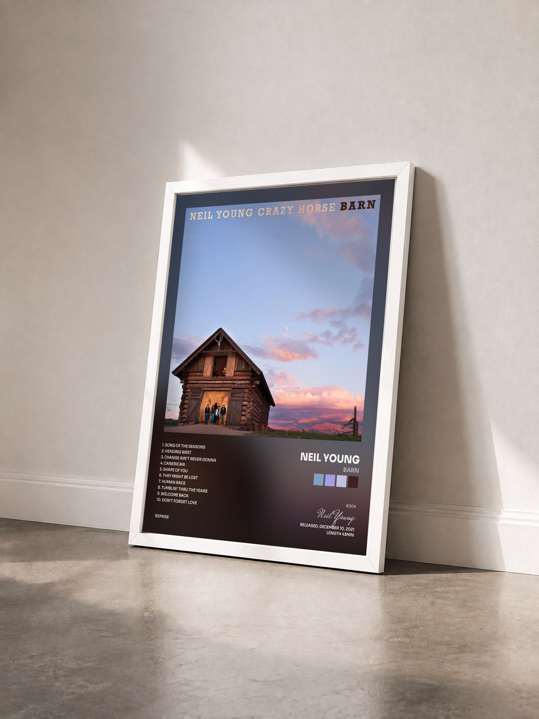 #blanc Tableau de l'album Barn de Neil Young vu de trois quarts, cadre blanc