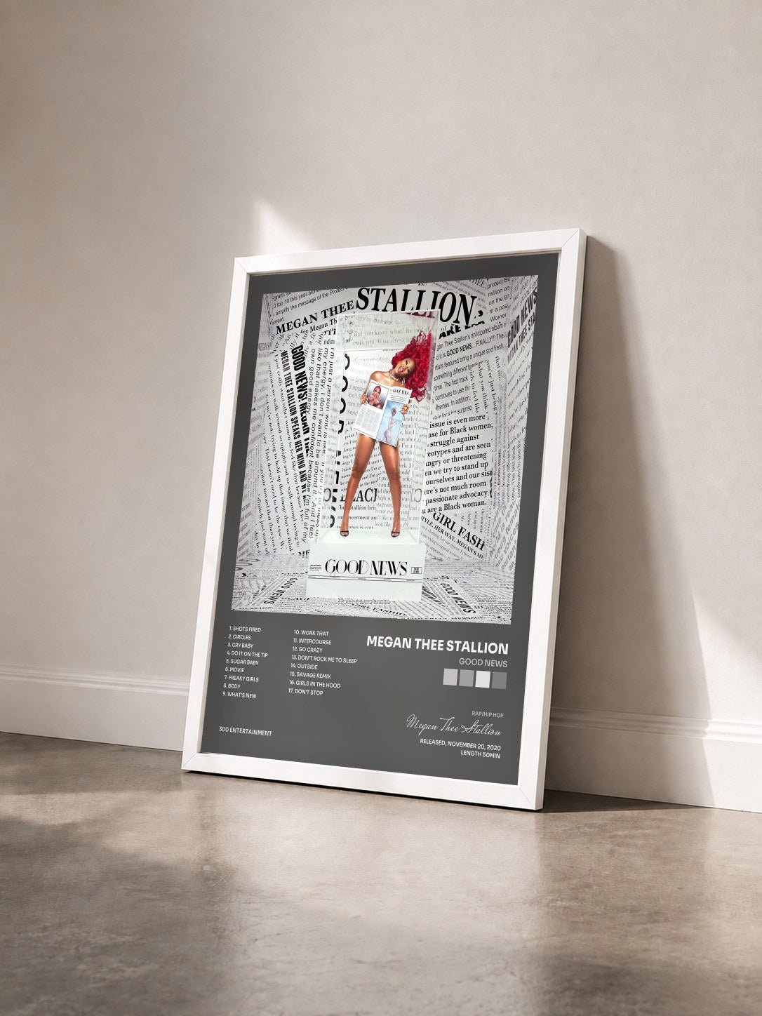 #blanc Tableau de l'album Good News de Megan Thee Stallion vu de trois quarts, cadre blanc