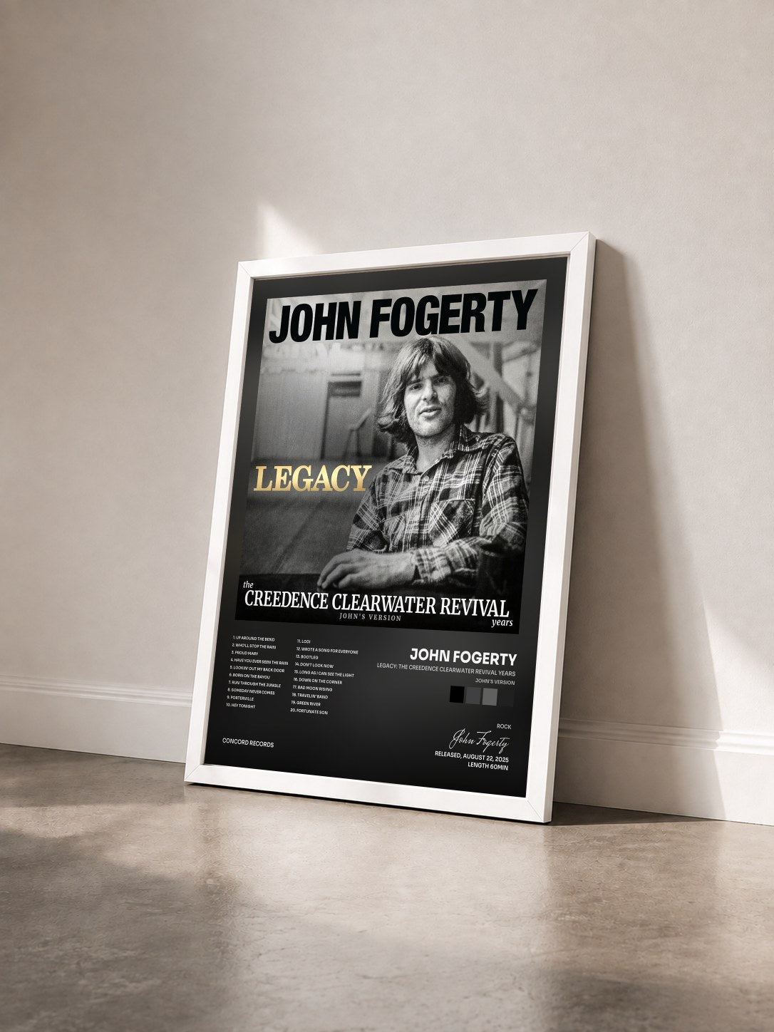 #blanc Tableau de l'album Legacy: the Creedence Clearwater Revival years (John's Version) de John Fogerty vu de trois quarts, cadre blanc