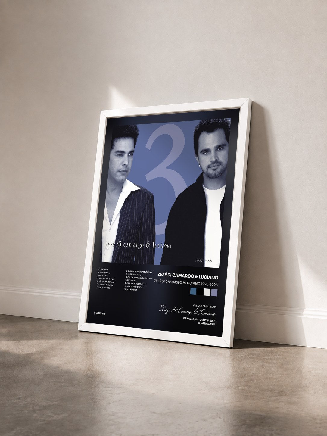 #blanc Tableau de l'album Zezé Di Camargo & Luciano 1995-1996 de Zezé Di Camargo & Luciano vu de trois quarts, cadre blanc